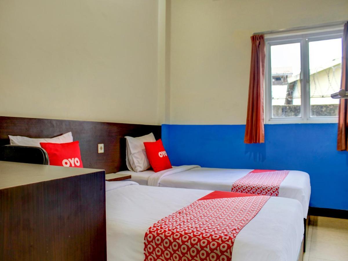 Oyo 90162 Remboelan Guest House Sungai Lutus Eksteriør billede