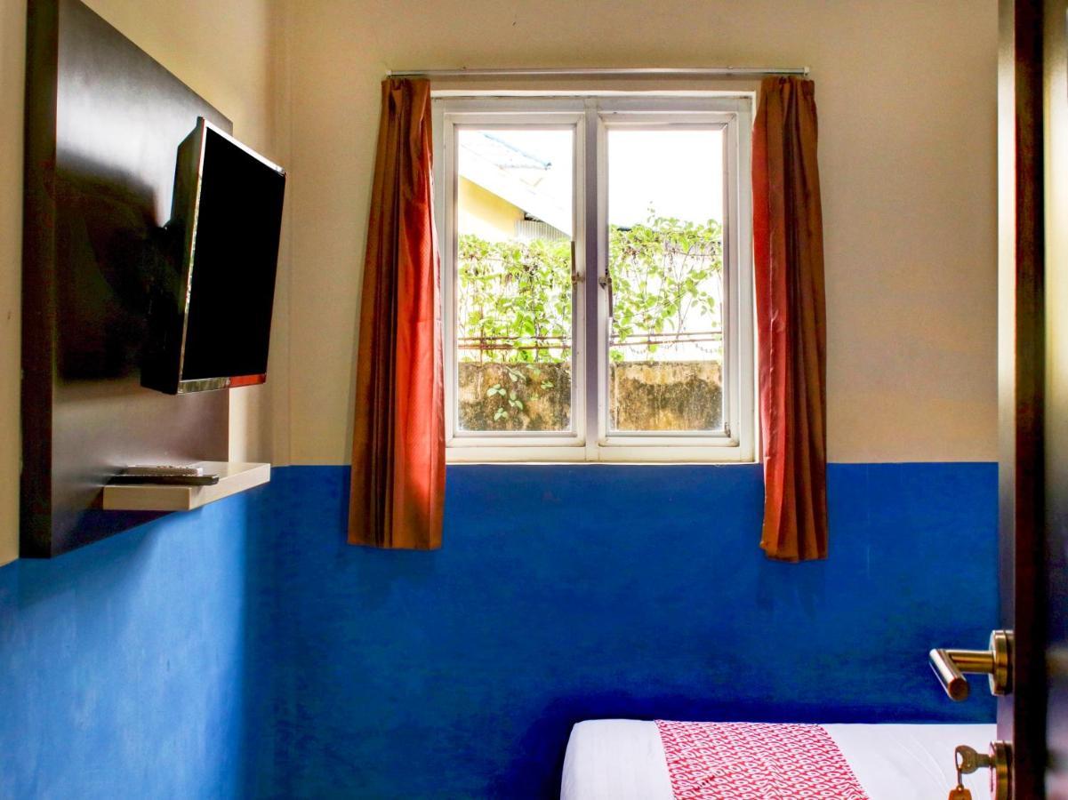 Oyo 90162 Remboelan Guest House Sungai Lutus Eksteriør billede