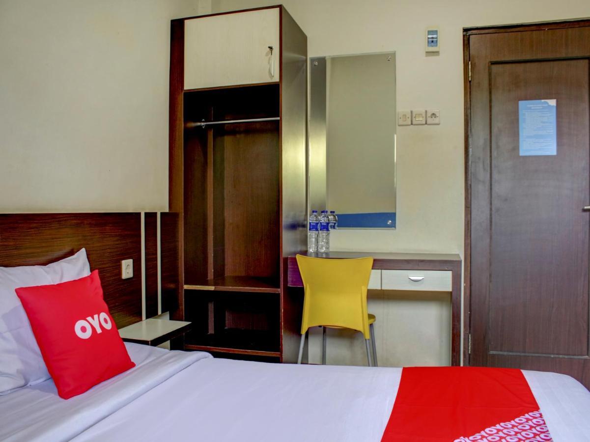 Oyo 90162 Remboelan Guest House Sungai Lutus Eksteriør billede