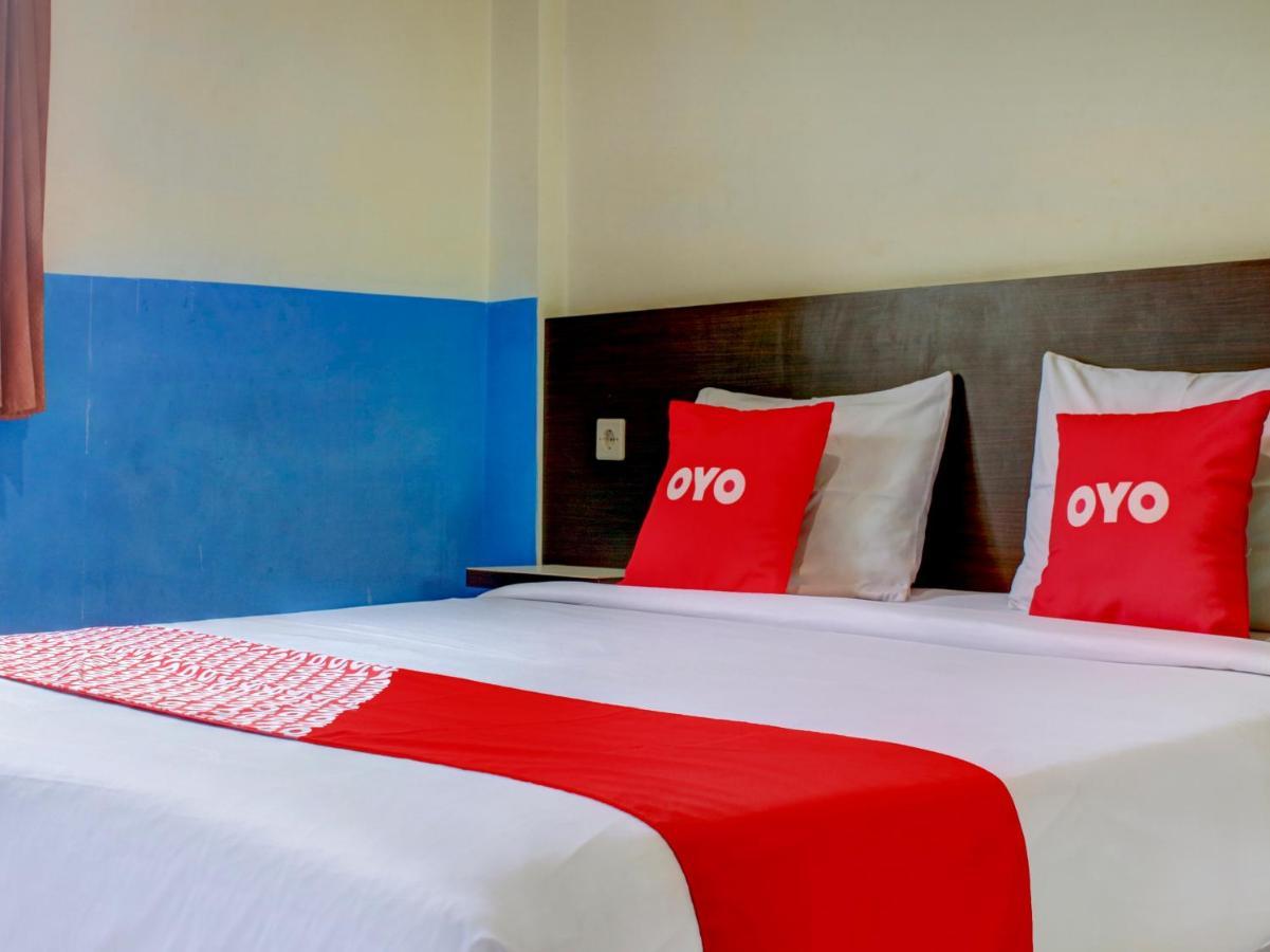 Oyo 90162 Remboelan Guest House Sungai Lutus Eksteriør billede