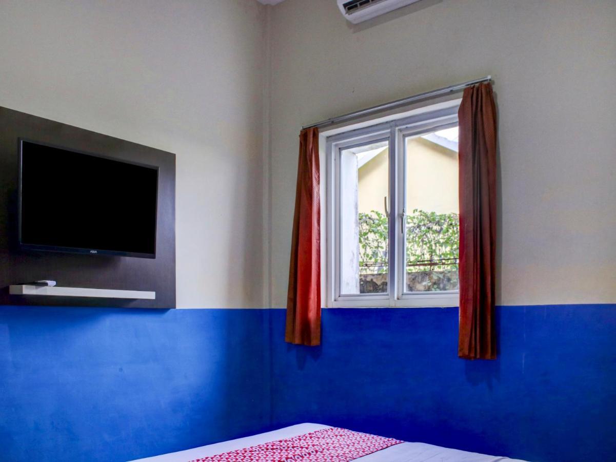 Oyo 90162 Remboelan Guest House Sungai Lutus Eksteriør billede